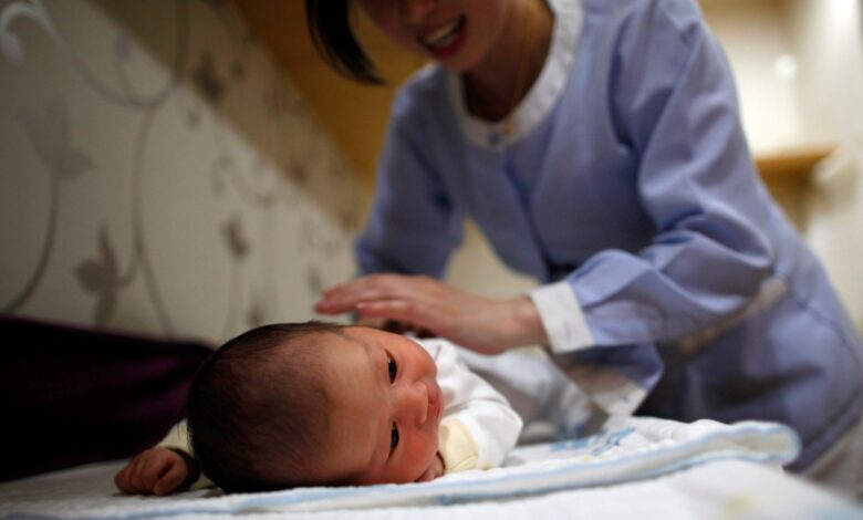 As Chinese shun parenthood, firms dangle bonuses, loans and leave
