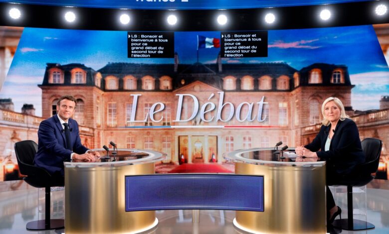 Macron and Le Pen clash over Russia, hijabs in fractious debate