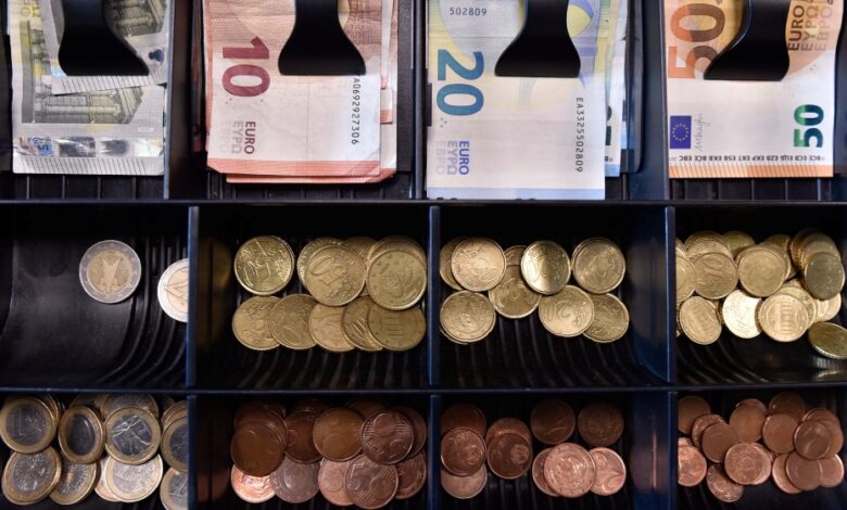 Euro drops below $1 for first time since 2002