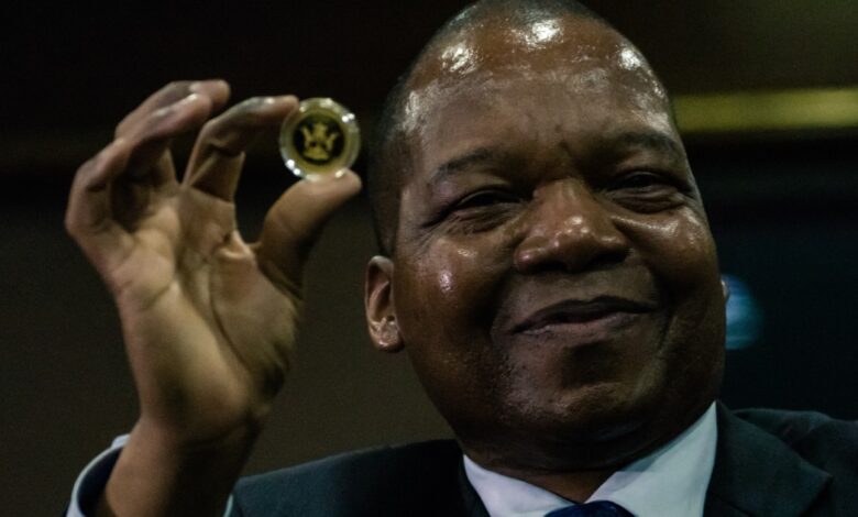 Zimbabwe launches gold coins to stem inflation