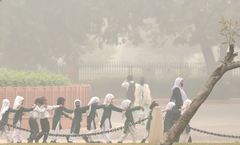 Photos: Smog-hit New Delhi extends school shutdown