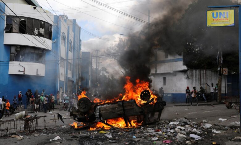 Five killed in clashes with police as protests rock Haiti