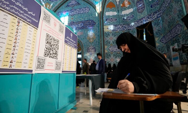 Polls open in Iran parliament elections amid predictions of low turnout